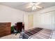 Cozy bedroom with a ceiling fan, closet, and dresser, a comfortable retreat at 8620 Brookway Cir, Tampa, FL 33635