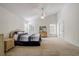 Spacious bedroom with carpeted floor and ceiling fan at 8620 Brookway Cir, Tampa, FL 33635