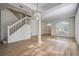 Open living area with hardwood floors, high ceilings, and lots of natural light at 8620 Brookway Cir, Tampa, FL 33635