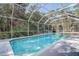 Inviting screened pool with ample surrounding deck space at 8620 Brookway Cir, Tampa, FL 33635