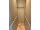 Small tiled bathroom with a shower at 3020 Sheppards Crook Ct, Holiday, FL 34691
