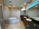 Bathroom with double vanity, soaking tub, and tile flooring at 3020 Sheppards Crook Ct, Holiday, FL 34691
