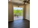 Private balcony with a table and chairs, overlooking lush landscape at 3020 Sheppards Crook Ct, Holiday, FL 34691