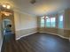 Formal dining room with hardwood floors and chandelier at 3020 Sheppards Crook Ct, Holiday, FL 34691