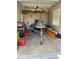 Garage with jet ski and kayak storage at 3020 Sheppards Crook Ct, Holiday, FL 34691