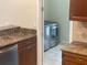 Convenient laundry room with washer and dryer hookups at 3020 Sheppards Crook Ct, Holiday, FL 34691