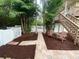 Brick pathway leading to a pool and patio area at 3020 Sheppards Crook Ct, Holiday, FL 34691