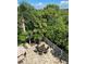 Large patio with seating area, great for outdoor entertaining at 3020 Sheppards Crook Ct, Holiday, FL 34691
