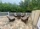 Relaxing patio with fire pit and seating area, perfect for outdoor entertaining at 3020 Sheppards Crook Ct, Holiday, FL 34691