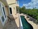 Private pool and patio with plenty of space for lounging and entertaining at 3020 Sheppards Crook Ct, Holiday, FL 34691