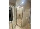 Large shower with glass enclosure and tile surround at 3020 Sheppards Crook Ct, Holiday, FL 34691