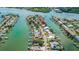 Aerial view of the property and surrounding waterfront homes at 341 Bahia Vista Dr, Indian Rocks Beach, FL 33785