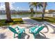 Waterfront patio with seating area and scenic canal views at 341 Bahia Vista Dr, Indian Rocks Beach, FL 33785