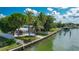 Charming waterfront home with lush landscaping and private dock at 341 Bahia Vista Dr, Indian Rocks Beach, FL 33785