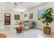Spacious living room with a view of the front door and stylish decor at 341 Bahia Vista Dr, Indian Rocks Beach, FL 33785