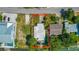 An aerial close-up of the home's roof and surrounding yard at 341 Bahia Vista Dr, Indian Rocks Beach, FL 33785