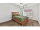 Cozy bedroom with plush carpet and light streaming through the windows, creates a warm and relaxing environment at 4327 Murfield E Dr, Bradenton, FL 34203