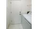 The laundry room features a washer, dryer, and storage space at 4327 Murfield E Dr, Bradenton, FL 34203