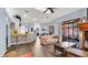 Open concept living area with kitchen, dining, and living room spaces at 4401 Plumosa St, Spring Hill, FL 34607
