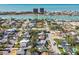 Top-down perspective of a coastal neighborhood, with homes, streets, and waterfront access in view at 504 79Th Ave, St Pete Beach, FL 33706