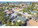 Elevated perspective of a property near the coast, showing surrounding homes and streets at 504 79Th Ave, St Pete Beach, FL 33706