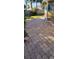 Brick paved patio in backyard, perfect for outdoor relaxation at 504 79Th Ave, St Pete Beach, FL 33706