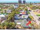 Aerial view showcasing the home's location in a neighborhood near the water at 504 79Th Ave, St Pete Beach, FL 33706