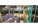 Bright screened porch with brick patio, offering backyard access at 504 79Th Ave, St Pete Beach, FL 33706
