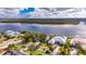 Bird's-eye view of a coastal property situated near a waterway at 6613 Seabird Way, Apollo Beach, FL 33572