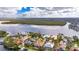 Elevated perspective of a property with water access at 6613 Seabird Way, Apollo Beach, FL 33572