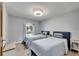 Bedroom with two twin beds, carpet, and a large window at 6613 Seabird Way, Apollo Beach, FL 33572