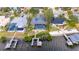 Private waterfront home with pool and dock nestled between two houses at 6613 Seabird Way, Apollo Beach, FL 33572