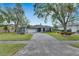 Front exterior of a single-story home with landscaping and a driveway at 6613 Seabird Way, Apollo Beach, FL 33572