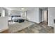 Large main bedroom with tile flooring, ceiling fan, and a king-size bed at 6613 Seabird Way, Apollo Beach, FL 33572