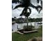 Peaceful waterfront view with canal and docked boats at 8384 Antwerp Cir, Port Charlotte, FL 33981