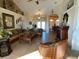 Living room with tile floors, high ceilings, and lots of natural light at 8384 Antwerp Cir, Port Charlotte, FL 33981