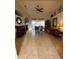 Bright and airy living room with a fireplace and view of the pool at 8384 Antwerp Cir, Port Charlotte, FL 33981
