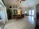 Living room with tile floors, high ceilings, and lots of natural light at 8384 Antwerp Cir, Port Charlotte, FL 33981