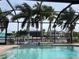 Relaxing screened-in pool area with canal views at 8384 Antwerp Cir, Port Charlotte, FL 33981