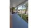 Spacious covered porch with views of the neighborhood at 8391 76Th Ave, Seminole, FL 33777