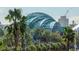 Aerial view of a glass-domed structure surrounded by palm trees at 912 Channelside Dr # 2412, Tampa, FL 33602