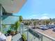 Balcony with parking lot views, plants, and privacy screen at 912 Channelside Dr # 2412, Tampa, FL 33602