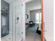 Modern bathroom with a glass-enclosed shower and a view to a small sitting area at 912 Channelside Dr # 2412, Tampa, FL 33602