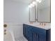 This bathroom showcases a stylish double vanity, a relaxing tub, and intricate tile work at 912 Channelside Dr # 2412, Tampa, FL 33602