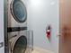 The laundry room includes a stacked washer and dryer unit at 912 Channelside Dr # 2412, Tampa, FL 33602