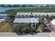 Aerial view showcasing property location and waterfront access at 9487 Tara Cay Ct, Seminole, FL 33776