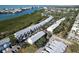 Aerial view of a waterfront townhouse community at 9487 Tara Cay Ct, Seminole, FL 33776