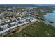 Aerial view of townhouses by the water at 9487 Tara Cay Ct, Seminole, FL 33776
