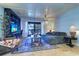 Bright living area featuring a sectional sofa and a view to the balcony at 9487 Tara Cay Ct, Seminole, FL 33776