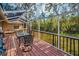 Inviting screened patio perfect for outdoor dining with peaceful backyard views and a hot tub at 1055 Riverside Ridge Rd, Tarpon Springs, FL 34688